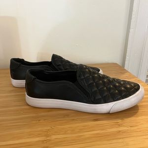 Black slip on sneakers